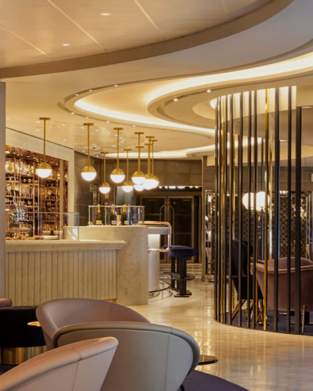 The bar at the Sip lounge on a Virgin Voyages ship